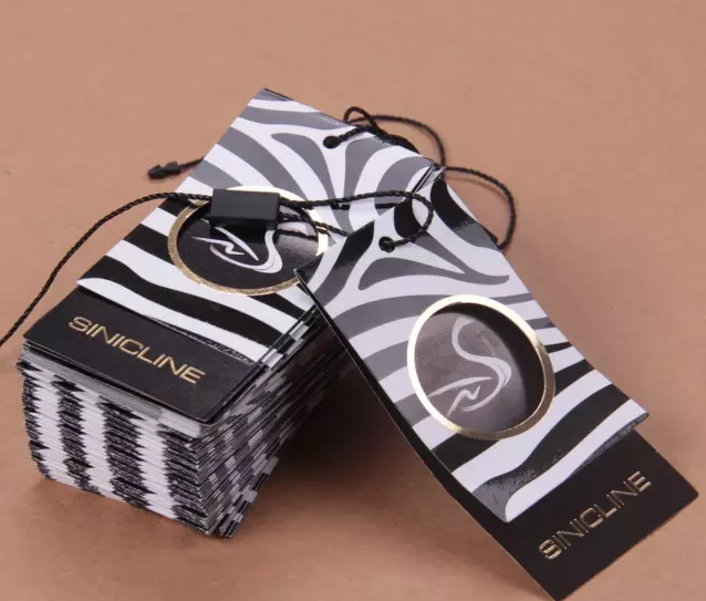 服裝吊牌生產(chǎn)廠家-廣州駿業(yè)包裝實(shí)業(yè)有限公司 服裝吊牌生產(chǎn)廠家